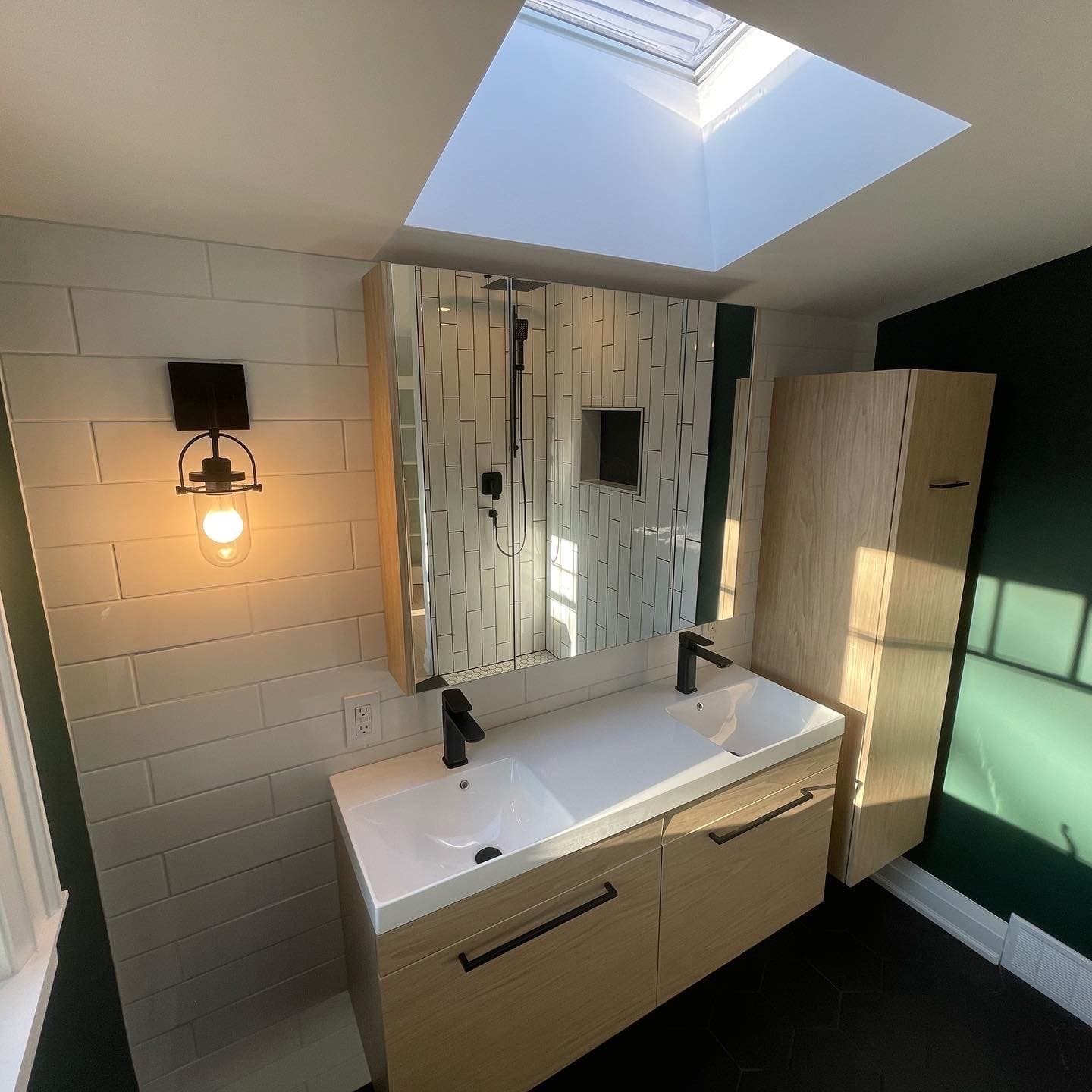 Bathroom renovation showcasing modern fixtures and tile work